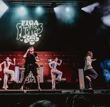 a group of people standing on a stage