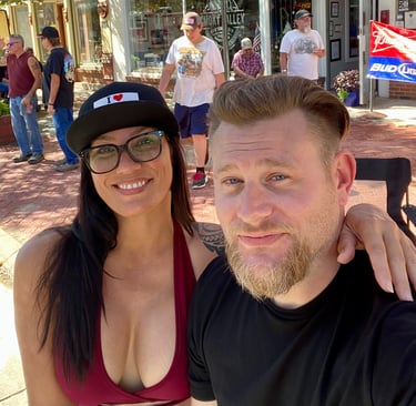 Man and woman posing for a picture