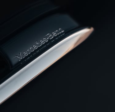 a close up of a mercedes benz door handle