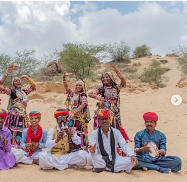 a group of people in traditional indian clothing