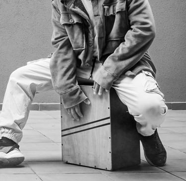 a band playing acoustic instruments e.g. cajon