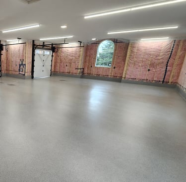 MMA quartz garage floor with smooth finish and radius cove base
