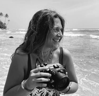 woman beach smiling with camera