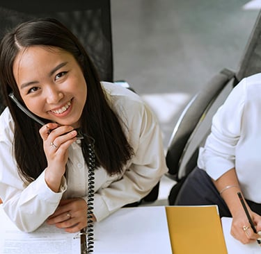 Female travel advisor on phone