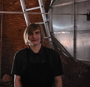 The owner of the lutz clock company inside a tower clock