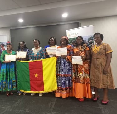 a group of people holding up certificates and holding certificates