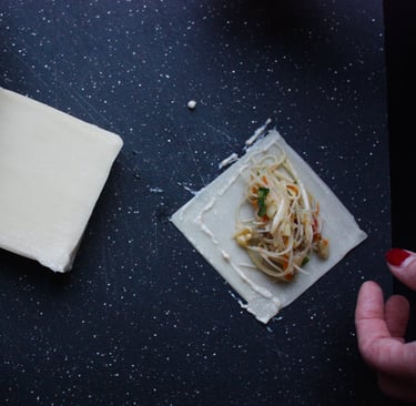 rolling Thai spring rolls
