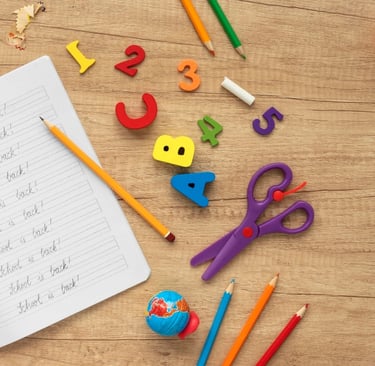 a notebook with a pencil and pencils on it