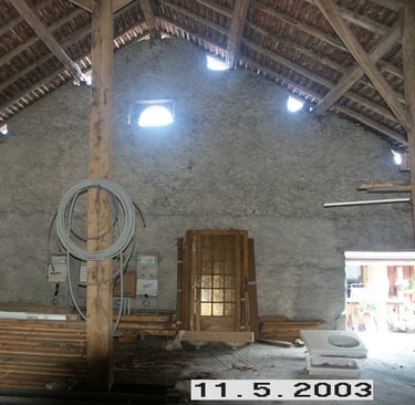 Grange avec murs et poutraison d'origine