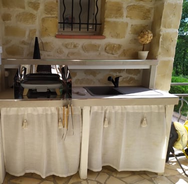 création d'une cuisine d'été extérieur sur une terrasse couverte 