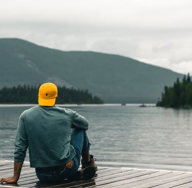Photo by Ali Kazal: https://www.pexels.com/photo/man-sitting-on-a-promenade-and-looking-at-the-horiz