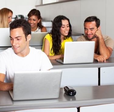 a group of people sitting at desks in a classroom-Ai-Integrated Digital Academy