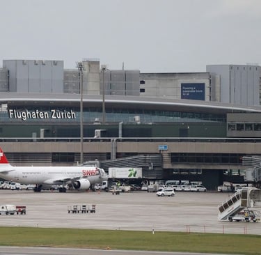 airplanes at an airport terminal
