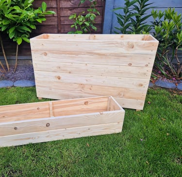 quality planters and plant boxes made from solid wood handmade in uk large and tall wooden troughs