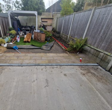 A before picture of the backyard patio