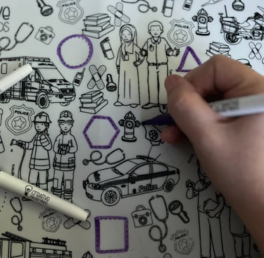 Child practicing letters on Scribbly Kids My First Alphabet reusable drawing mat