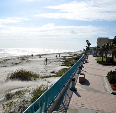daytona beach with people walking on the sand