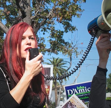 Animal welfare activist Lacey Sculls, née Conner, speaking at a rally to end the sale of animal fur