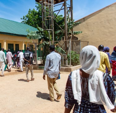 CHAD International staff leading learning facilitators to the training venue