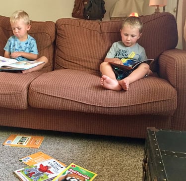 kids reading library books for school