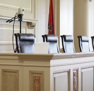 Arkansas Historic Supreme Court seats sit empty. This courthouse was established in 1836.