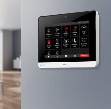Clare One home automation touch screen controlling thermostat, lighting, and doors