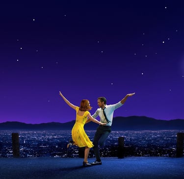 Stone and Gosling dance in silhouette against a city skyline in La La Land (2016)