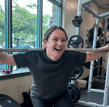 jessica kimball profile pic holding a bar