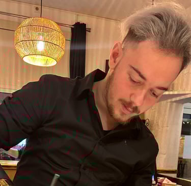 a man in a black shirt is preparing to serve a drink