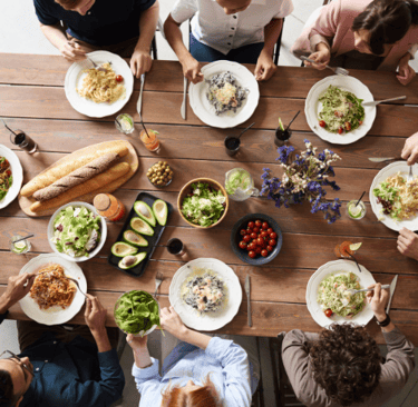 Large family dinner seen from above