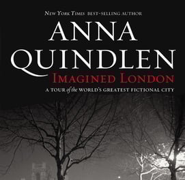 a bus stop sign in front of a bus stop