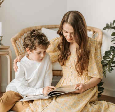 mother and son are reading a book