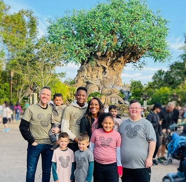 Shani Roberts pictured with her family at Disney's Animal Kingdom® Park, at Walt Disney World®.