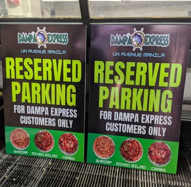 Dampa Express reserved parking sintra board sign for customers.