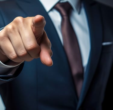 Businessman pointing at viewer – your responsibility in strategic IP management