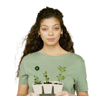 Hands holding organic compost in garden
