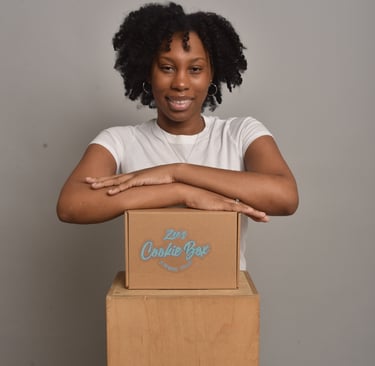 beautiful black woman smiling with cookies