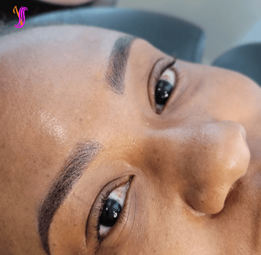 Close-up of beautiful powder or Ombre brow on a client