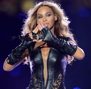 Beyoncé showing up Illuminati hand sign