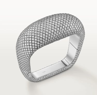 Cartier diamond-encrusted bracelet with a modern geometric design.