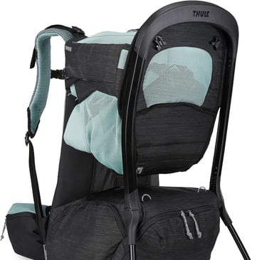 a baby carrier with a baby in a sling bag