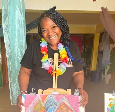 a woman holding a painting of a painting of a woman