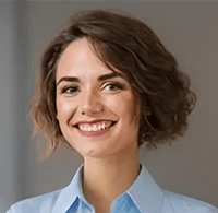 Smiling woman headshot in light blue shirt. Tech support testimonial from happy Cedar Rapids client.