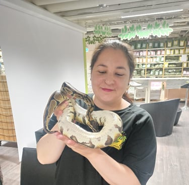a woman holding a snake snake snake snake snake snake snake snake snake snake snake snake
