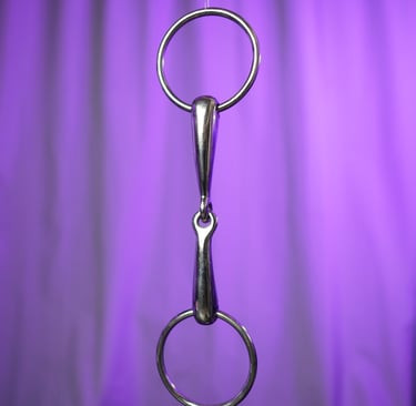a pair of scissors and a pair of scissors on a table