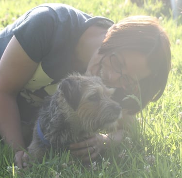 Suzanne from Bark and Ride with her Border Terrier, Stan