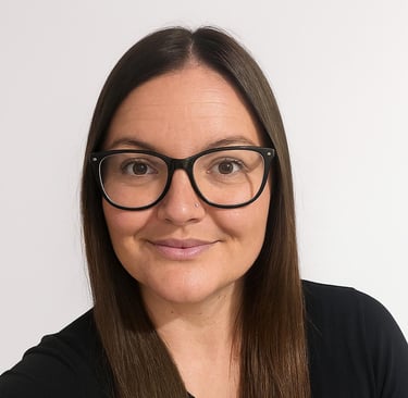 a woman with glasses and a black top