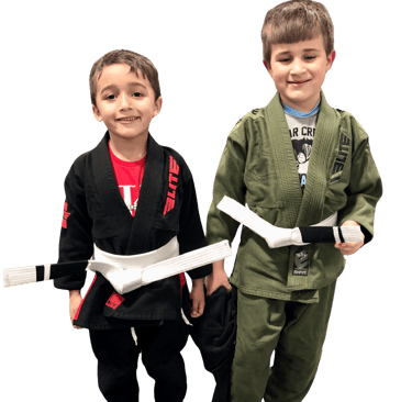 two boys in BJJ unifrorms standing next to each other