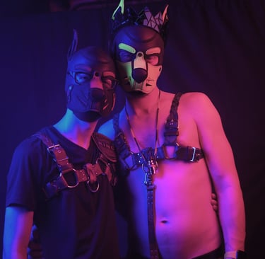 Two men in. pup gear.