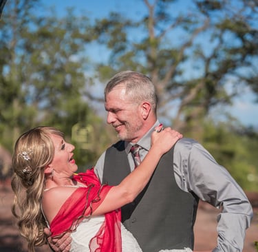a man and woman are holding each other